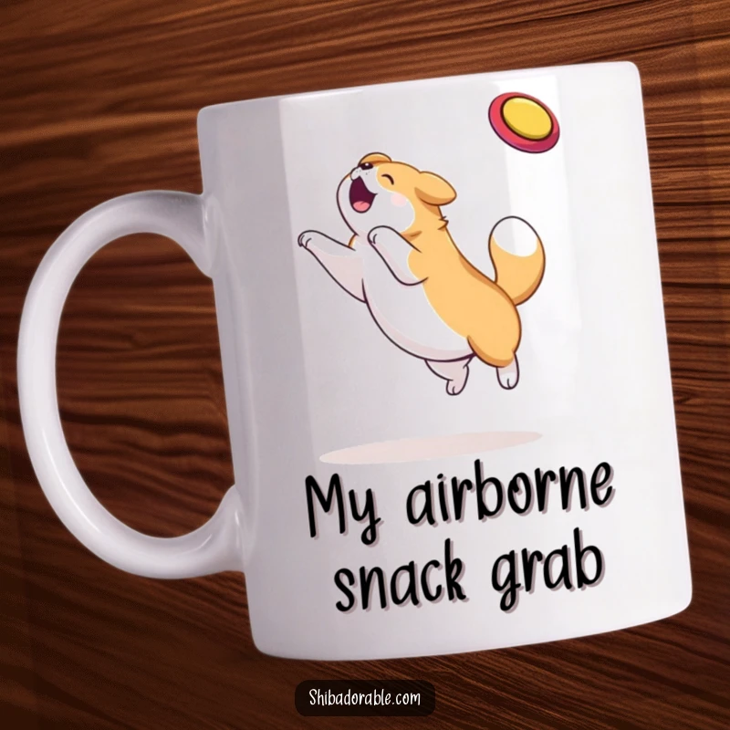 Funny dog mug showing a plump, happy dog soaring mid-air to catch a frisbee, tail wagging furiously, pure joy captured.