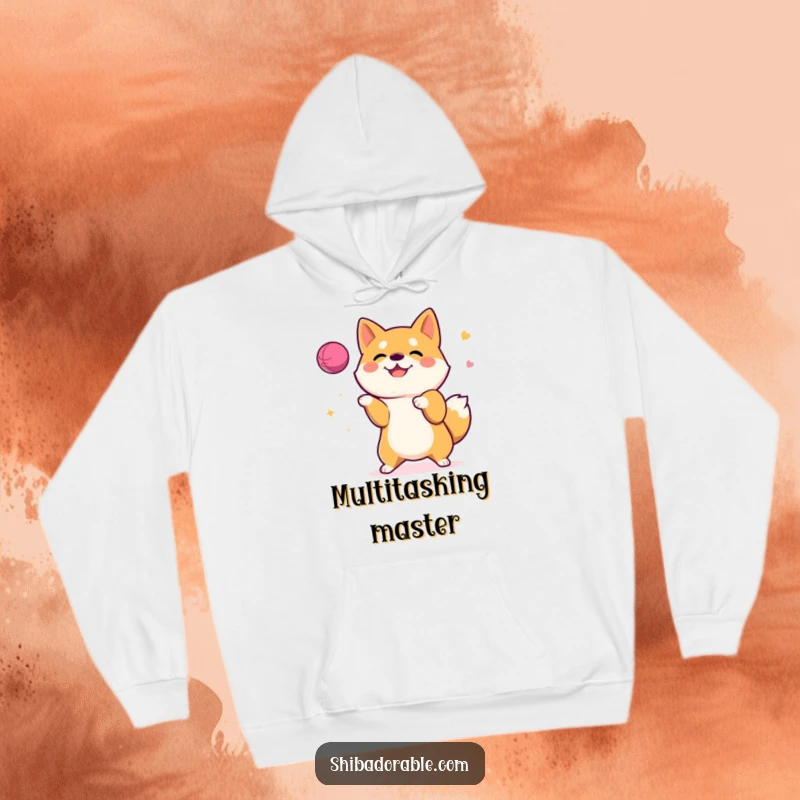 Funny Hoodie featuring a happy Shiba Inu dog juggling a ball, merging warmth with canine comedy.