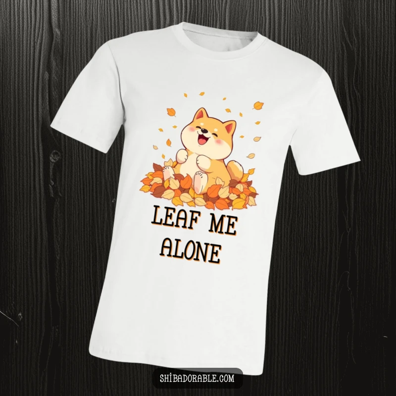 Funny Shiba Inu T-Shirt: A Shiba Inu happily rolls in a heap of vibrant autumn leaves, embodying pure seasonal joy.